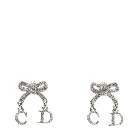 dior ring with bow|Dior bow earrings.